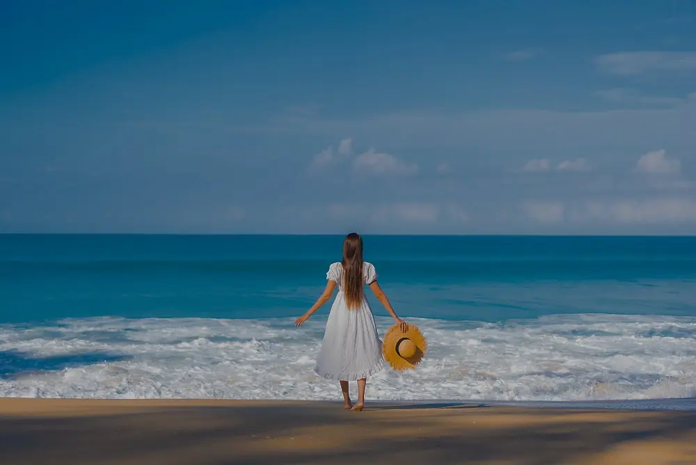portrait-beautiful-young-asian-woman-relaxing-around-beach-with-white-clouds-blue-sky-travel-vacatio